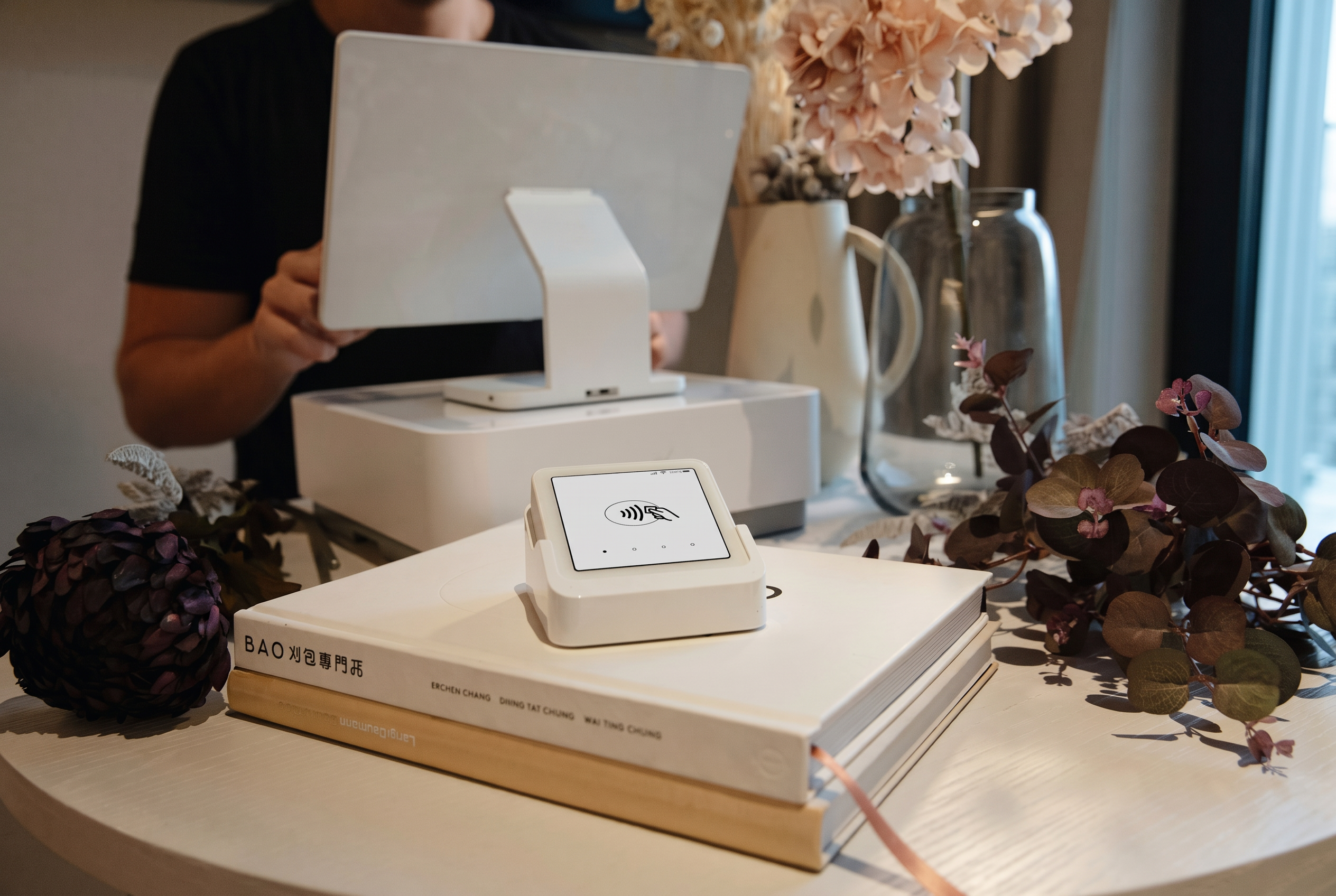Card reader and point-of-sale system at a business counter